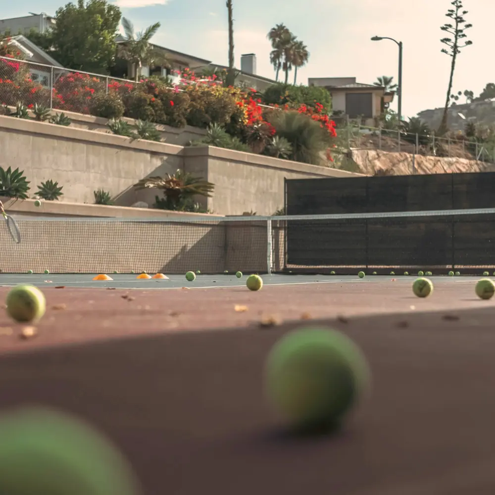 Adult players rallying together during Cardio Tennis session at LBTA